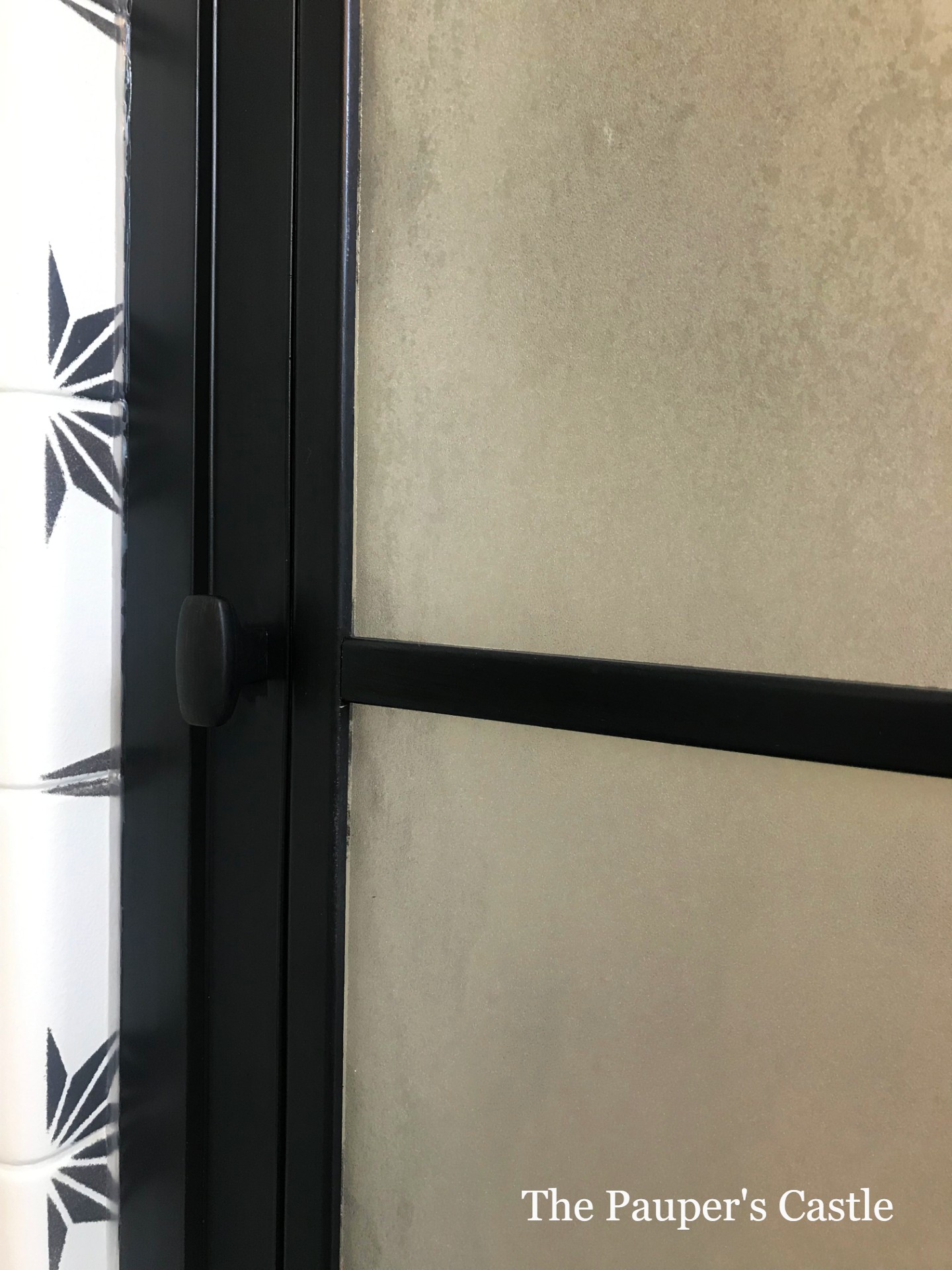 Don't replace, Restyle your old shower doors with paint and trim. The